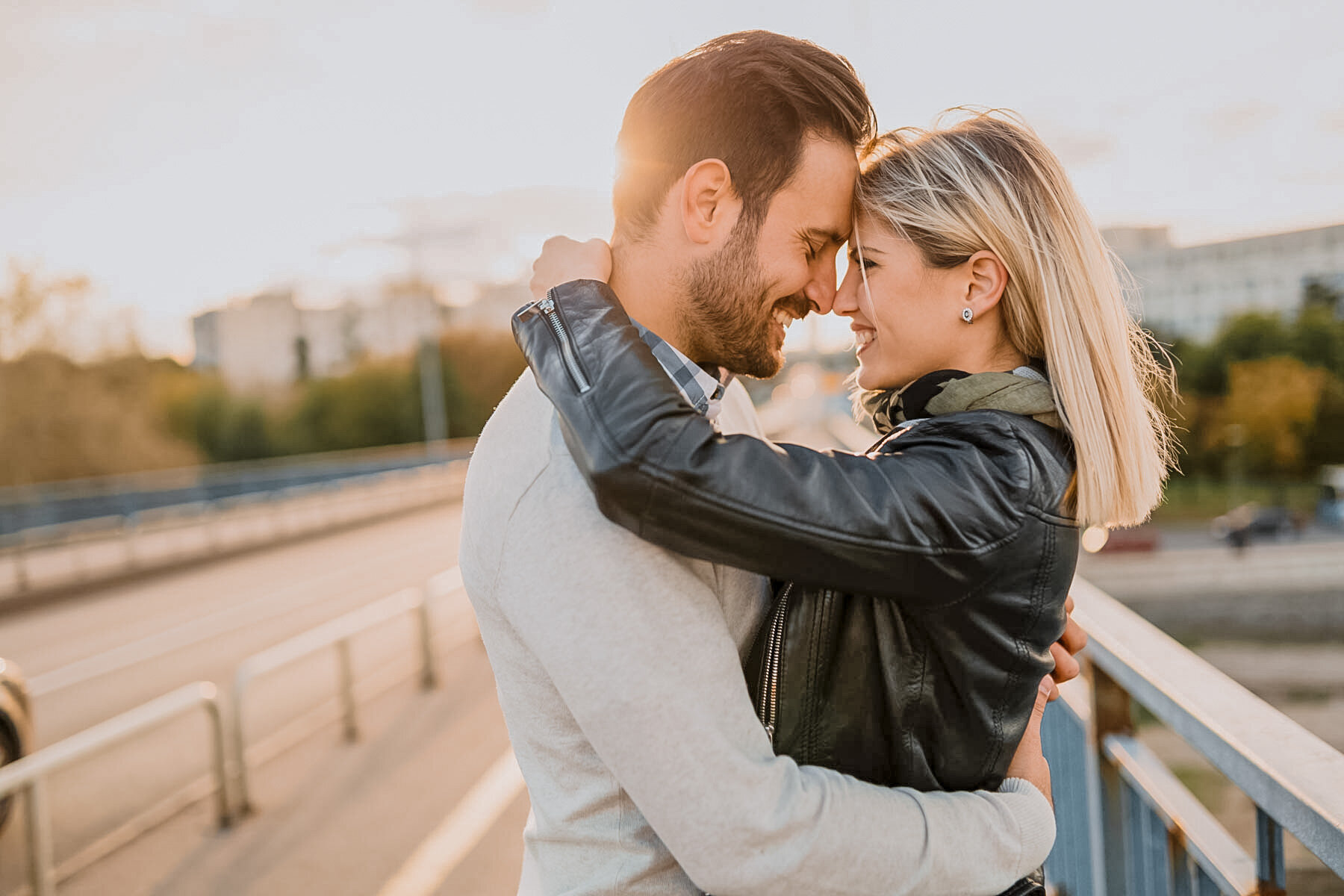 Couple embracing, forehead to forehead